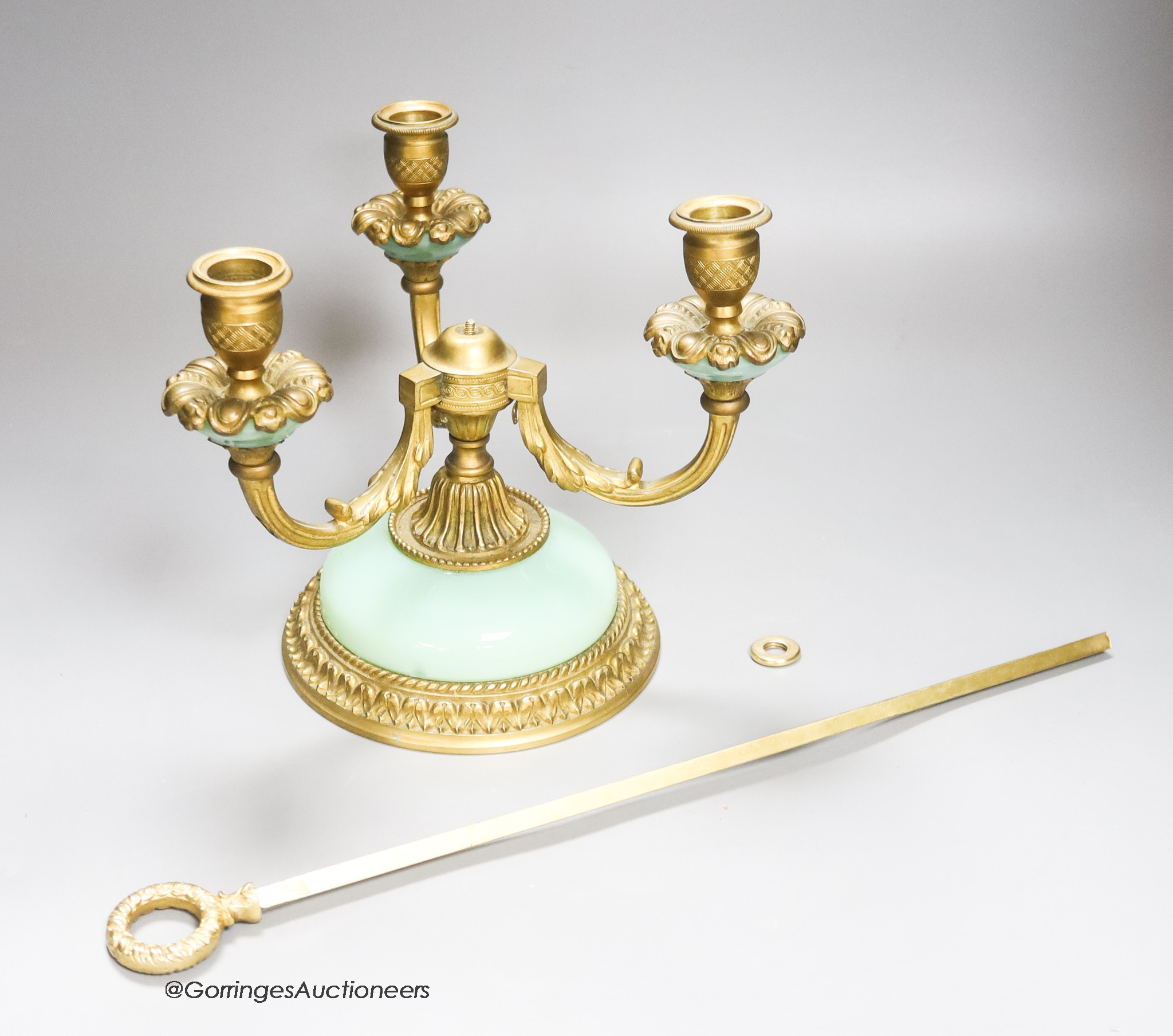 An ormolu lamp and a small print